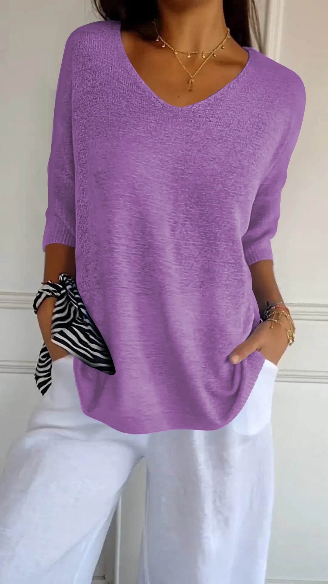 Solid-colored knit top with V-neck Cairns Closet