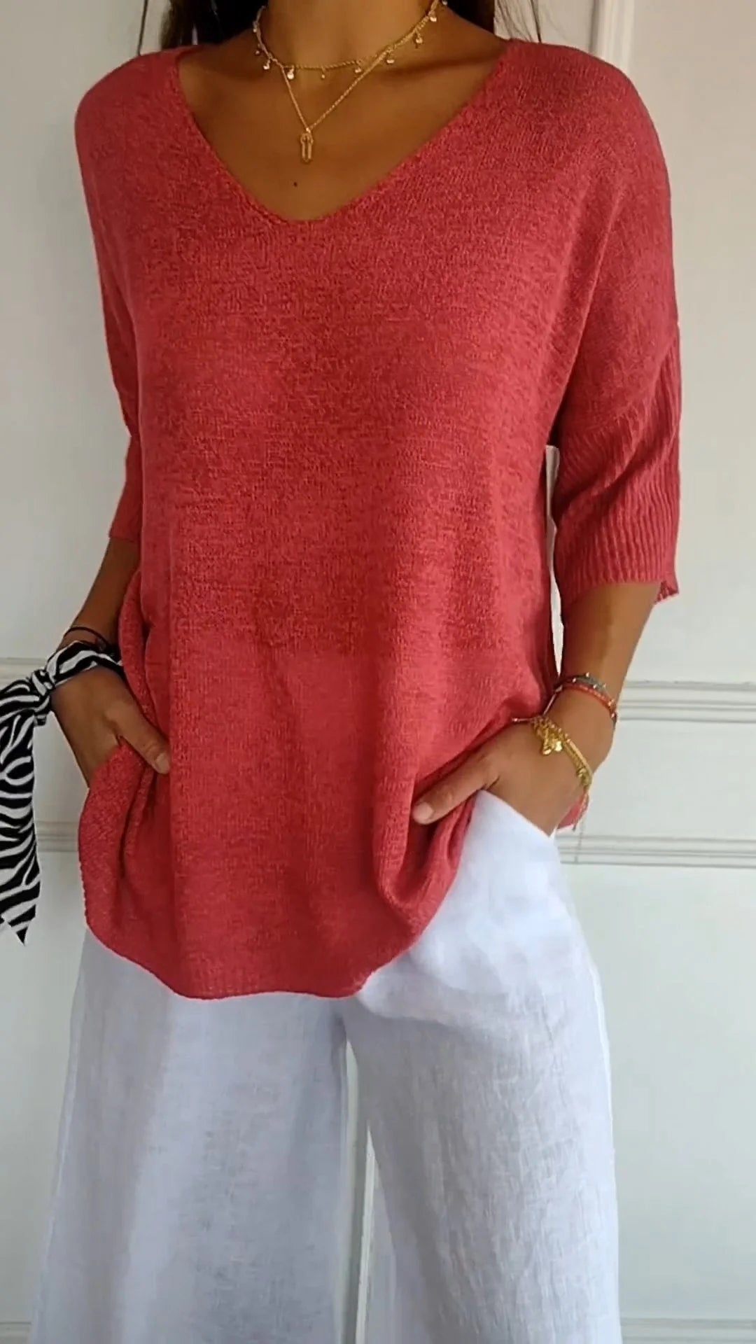 Solid-colored knit top with V-neck Cairns Closet