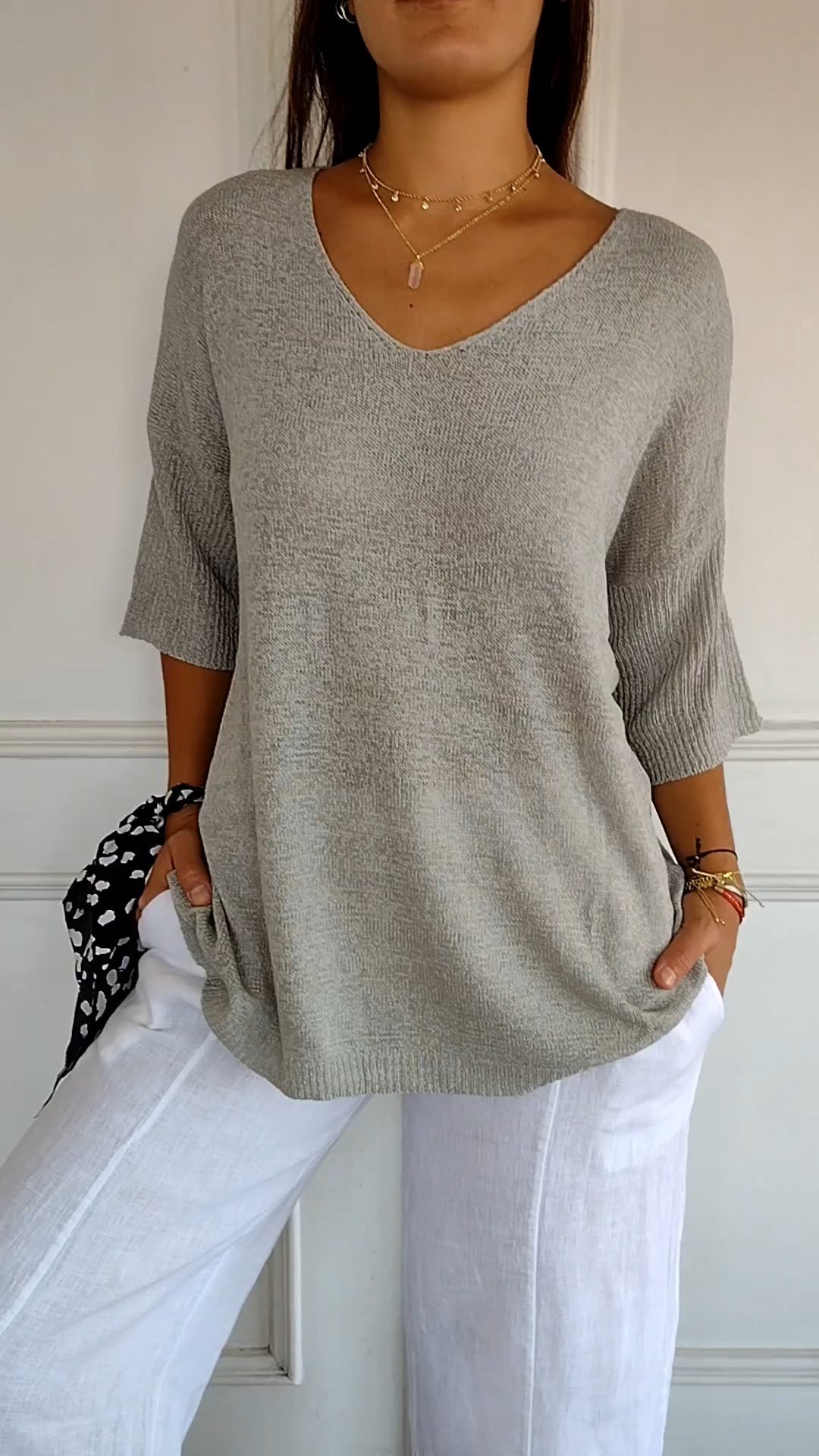 Solid-colored knit top with V-neck Cairns Closet